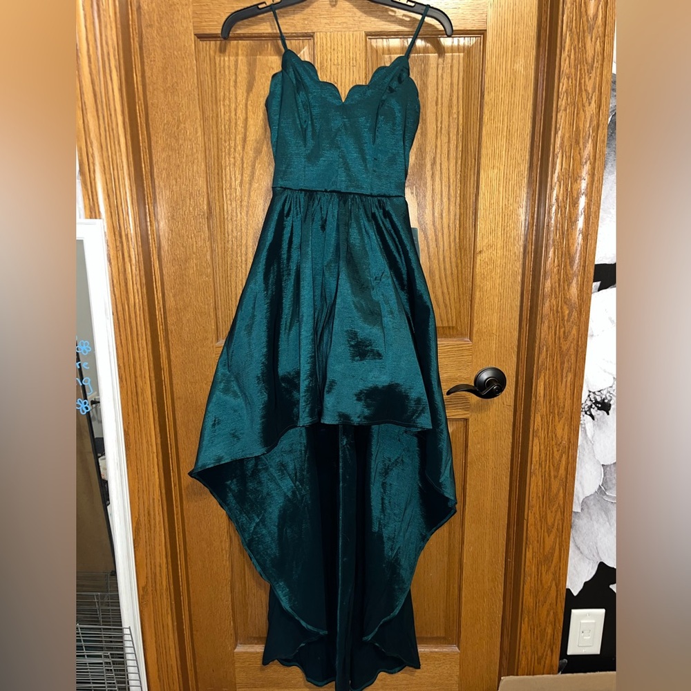 Emerald high-low formal dress
B. Smart size 3